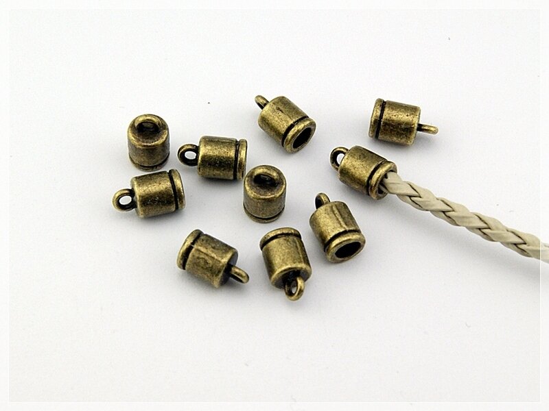 Endkappen in antik Bronze 10 x 6 mm für 4 mm Bänder 10 Stück