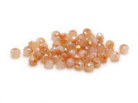 Glasschliffperlen "Doll" 4 x 3 mm  in goldbeige...