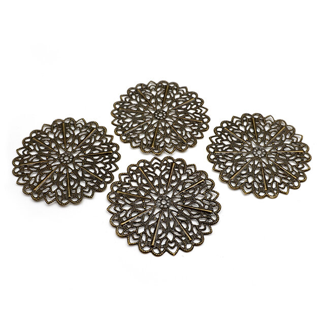 4 filigrane Blumenanhänger in antik Bronze