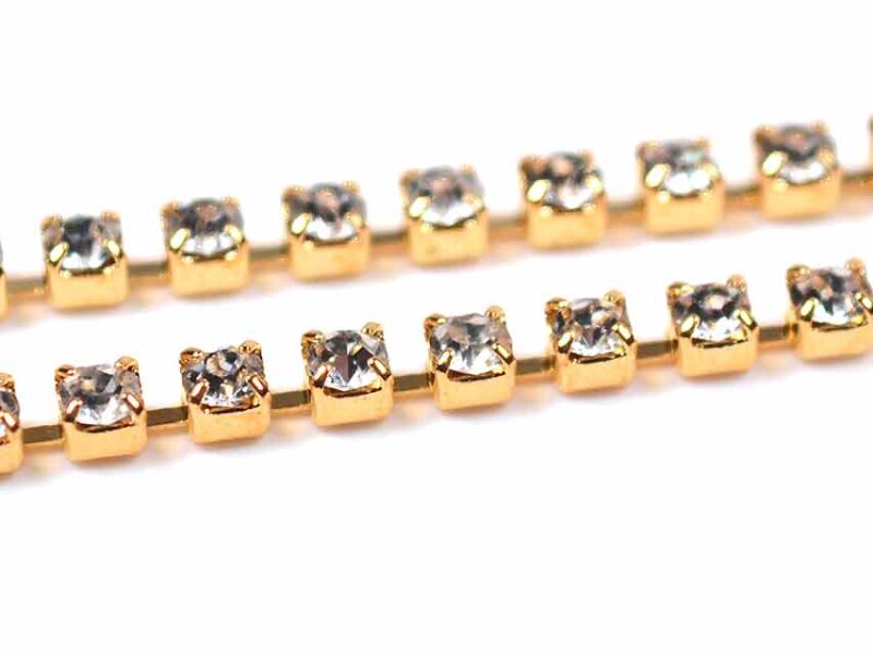 Goldfarbene Kette mit weißen Strasssteinen 1 m