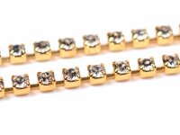 Goldfarbene Kette mit weißen Strasssteinen 1 m