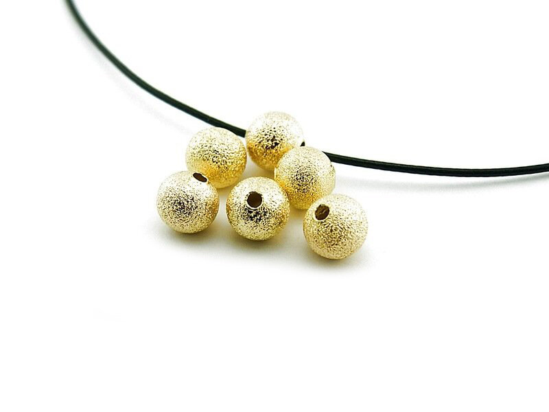 10 Zwischenperlen 8 mm goldfarben