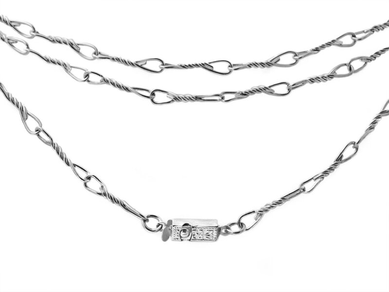 fertige Gliederkette mit langen gedrehten Gliedern in platinfarben 100cm