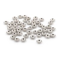geprägte Zwischenperlen 5 mm in antik silberfarben...
