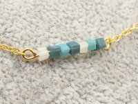 Glasschliffperlen als Würfel in creme 2mm 50 Stück