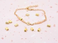 Perlen als Rechteck in goldfarben 6x2,5 mm 50 Stück