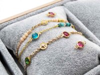 kleine Verbinder aus Messing in goldfarben mit...