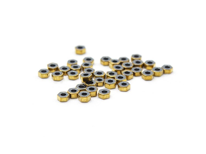 Perlen als Hexagon aus synthetischem Hämatit in goldfarben 2mm 40 Stück
