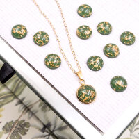 Resincabochons in grün mit goldfarbenem Glitter 12mm...
