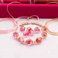 Glasperlen als Melone in rot mit Schimmer in gold 10mm 8...
