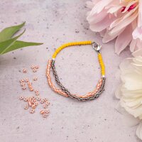 gestreifte Rocailles Perlen in Weiß und Orange 3 mm...
