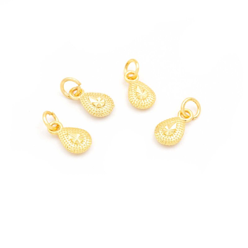 Anhänger mit Prägung Tropfen in goldfarben 11x6mm 4 Stück