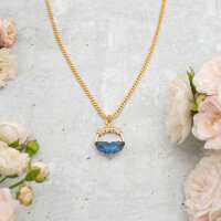 goldfarbener Anhänger mit Schmuckstein in blau und...