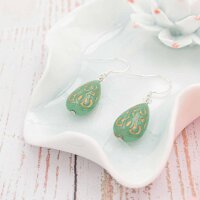 Acrylperlen als Tropfen in Mint mit goldener Verzierung...