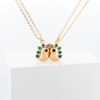 Partnerkette mit Dinosaurier und Zirkonia in Goldfarben