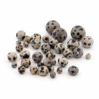 Dalmatiner Jaspis Perlen Mystery Bag 4-12 mm 20 Gramm