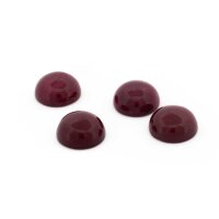 Vier lose Cabochons aus gefärbter Jade in...
