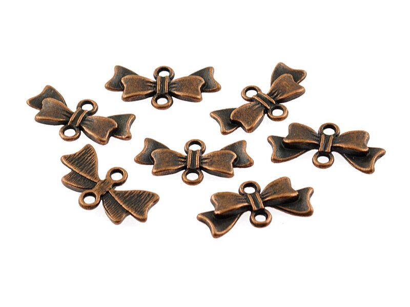 8 Verbinder als Schleifchen in antik Kupfer