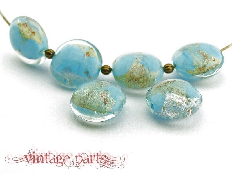 4 Lampwork Glasperlen in azur mit Gold- und Silberfolie