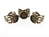 4 verzierte Ringrohlinge in antik Bronze mit Fassung...