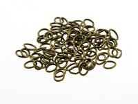 100 längliche Biegeringe in antik Bronze, 5 x 4 mm