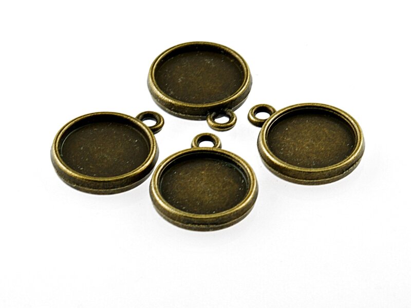 6 doppelseitige Fassungen für 12 mm Cabochons in antik Bronze