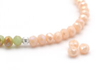 50 Glasschliffperlen "Doll" in beige, 4x3 mm