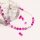 50 Crackleglasperlen in pink und weiß, 6 mm