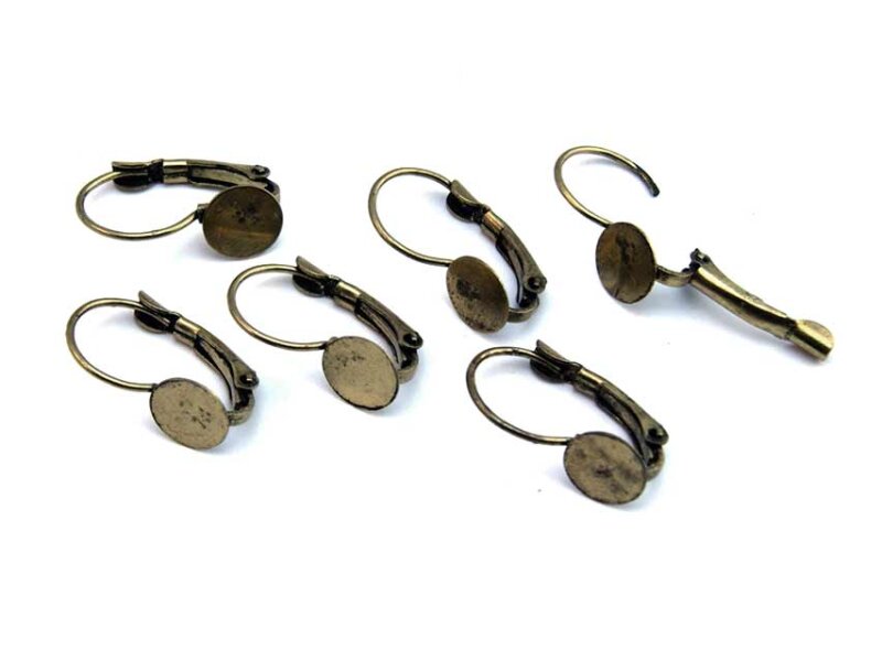 10 Brisuren in antik Bronze mit Klebepad