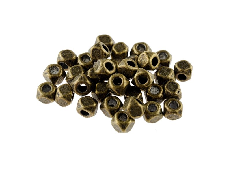 20 Zwischenperlen "Polygon" in antik bronzefarben, 2 x 3 mm