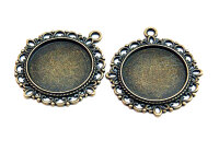 Fassungen in antik bronze rund für 20 mm Cabochons...